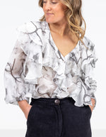 Melody V Neck Ruffle Front Top in Grey Print