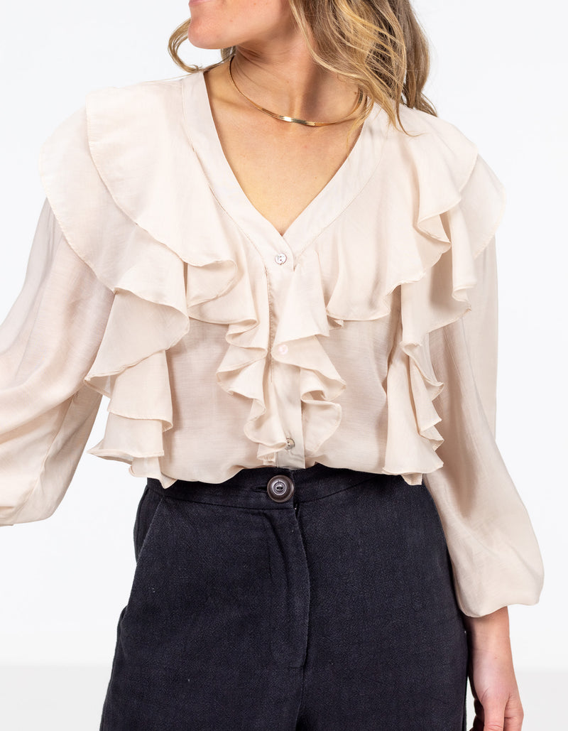 Kitty V Neck Ruffle Front Top in Beige