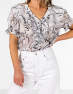 Vesper Short Sleeve Ruffle Front Top in Grey Print