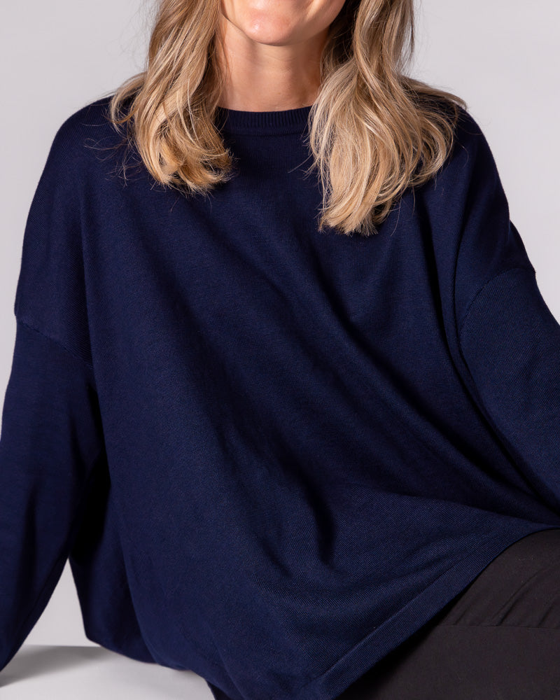 Navy cotton-blend knit jumper featuring a classic crew neckline and a relaxed, oversized silhouette.