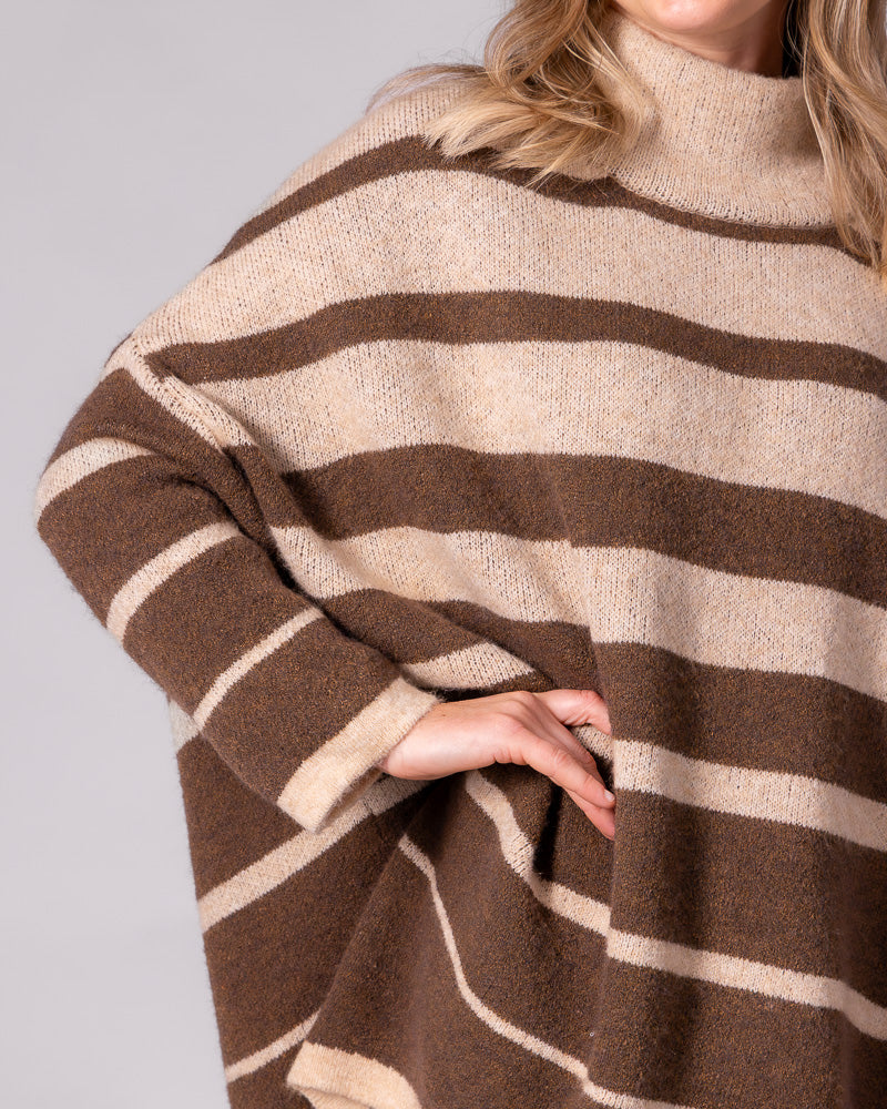 Brown striped oversized brushed knit jumper featuring a relaxed drop shoulder, wide sleeves, and soft funnel neck.