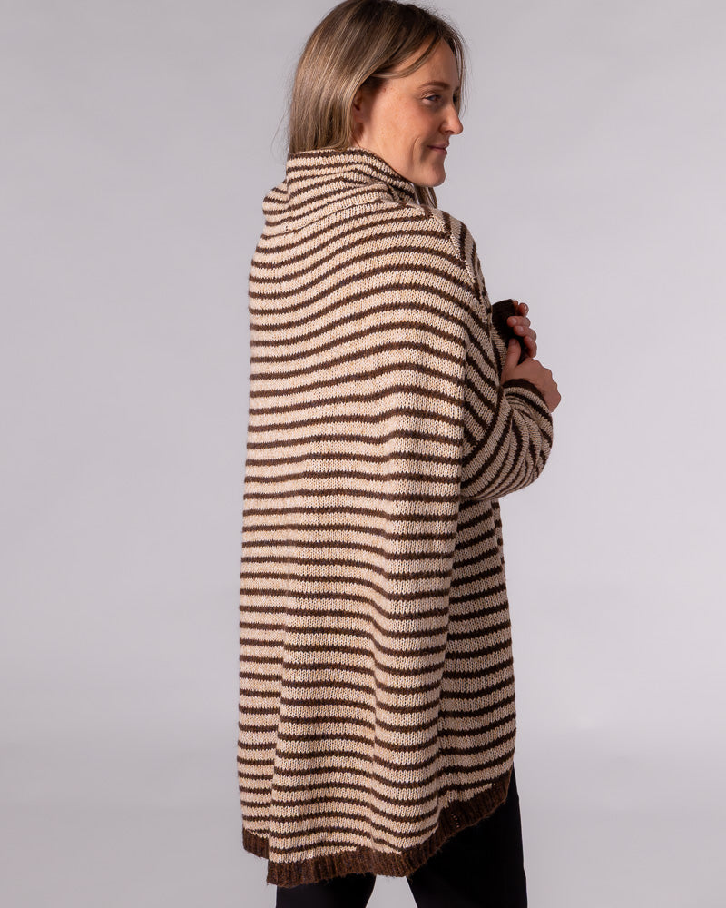 Oversized chocolate and beige striped knit jumper with a funnel neck, drop shoulders and a high-low scooped hem.