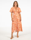 Gigi V-Neck Cut Out Midi Dress in Orange Print